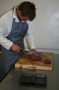Alex cutting steaks